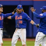 
              New York Mets players, from left, Mark Canha, Travis Jankowski and Starling Marte celebrate after defeating the Atlanta Braves in the the first baseball game of a doubleheader, Tuesday, May 3, 2022, in New York. The Mets won 5-4. (AP Photo/Frank Franklin II)
            