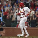 
              St. Louis Cardinals' Harrison Bader (48) scores in the third inning during a baseball game against the Milwaukee Brewers on Friday, May 27, 2022, in St. Louis. (AP Photo/Michael B. Thomas)
            