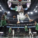 
              Milwaukee Bucks' Brook Lopez dunks during the first half of Game 3 of an NBA basketball Eastern Conference semifinals playoff series Saturday, May 7, 2022, in Milwaukee. (AP Photo/Morry Gash)
            