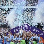 
              Manchester City players celebrate with trophy after winning the 2022 English Premier League title at the Etihad Stadium in Manchester, England, Sunday, May 22, 2022. (AP Photo/Dave Thompson)
            