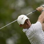 
              Rory McIlroy, of North Ireland, watches his tee shot on the 12th hole during a practice round for the PGA Championship golf tournament, Tuesday, May 17, 2022, in Tulsa, Okla. (AP Photo/Sue Ogrocki)
            