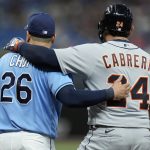 
              Detroit Tigers' Miguel Cabrera (24) hugs Tampa Bay Rays first baseman Ji-Man Choi (26) after his single off pitcher Corey Kluber during the fourth inning of a baseball game Monday, May 16, 2022, in St. Petersburg, Fla. (AP Photo/Chris O'Meara)
            