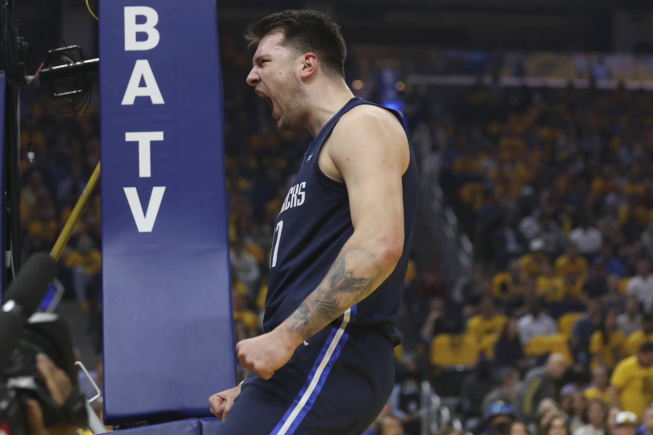 Dallas Mavericks guard Luka Doncic reacts against the Golden State Warriors during the first half o...