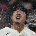 
              Milwaukee Brewers' Keston Hiura celebrates after hitting a walkoff two-run home run during the 11th inning of a baseball game against the Atlanta Braves Wednesday, May 18, 2022, in Milwaukee. The Brewers won 7-6. (AP Photo/Morry Gash)
            