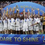 
              FILE - The United States' team celebrates with the trophy after winning the Women's World Cup final soccer match against The Netherlands at the Stade de Lyon in Decines, outside Lyon, France, July 7, 2019. The U.S. Soccer Federation agreed to landmark collective bargaining agreements with its men's and women's teams, equalizing compensation for the first time.The CBAs announced Wednesday, May 18, 2022, run through 2028. The USSF is the first national governing body to promise both sexes matching money. (AP Photo/Alessandra Tarantino, File)
            