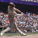 
              San Diego Padres' Wil Myers hits an RBI single against the San Francisco Giants during the first inning of a baseball game in San Francisco, Sunday, May 22, 2022. (AP Photo/John Hefti)
            