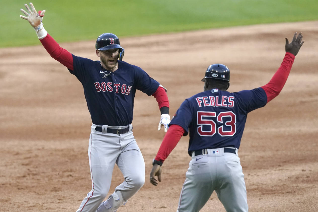 Boston Red Sox's Trevor Story, left, celebrates his three-run home run off Chicago White Sox starti...