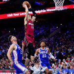 
              Miami Heat's Tyler Herro, center, goes up for a shot against Philadelphia 76ers' Georges Niang and Matisse Thybulle during the first half of Game 3 of an NBA basketball second-round playoff series, Friday, May 6, 2022, in Philadelphia. (AP Photo/Matt Slocum)
            