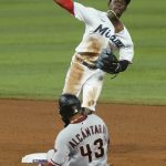 
              Arizona Diamondbacks shortstop Sergio Alcantara (43) is forced out by Miami Marlins second baseman Jazz Chisholm Jr. (2) during the fifth inning of a baseball game, Tuesday, May 3, 2022, in Miami. (AP Photo/Marta Lavandier)
            