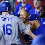 
              Los Angeles Dodgers' Will Smith (16) celebrates his home run against the Arizona Diamondbacks with teammates, including Justin Turner, front right, and Mookie Betts, middle, during the second inning of a baseball game Sunday, May 29, 2022, in Phoenix. (AP Photo/Ross D. Franklin)
            