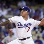 
              Los Angeles Dodgers starting pitcher Julio Urias throws to the plate during the first inning of a baseball game against the Philadelphia Phillies Saturday, May 14, 2022, in Los Angeles. (AP Photo/Mark J. Terrill)
            