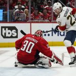 
              Washington Capitals goaltender Ilya Samsonov (30) stops the puck from Florida Panthers center Carter Verhaeghe (23) during the second period of Game 4 in the first round of the NHL Stanley Cup hockey playoffs, Monday, May 9, 2022, in Washington. (AP Photo/Alex Brandon)
            