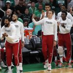 
              The Miami Heat bench reacts to a 3-pointer by Kyle Lowry against the Boston Celtics during the first half of Game 6 of the NBA basketball playoffs Eastern Conference finals Friday, May 27, 2022, in Boston. (AP Photo/Michael Dwyer)
            
