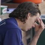 
              Seattle Mariners starting pitcher Logan Gilbert sits in the dugout after the top of the fourth inning of a baseball game after he gave up a grand slam to Philadelphia Phillies' Rhys Hoskins, Wednesday, May 11, 2022, in Seattle. (AP Photo/Ted S. Warren)
            