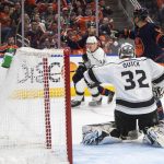 
              Los Angeles Kings' goalie Jonathan Quick (32) gives up a goal to Edmonton Oilers' Darnell Nurse (25) during the second period of Game 2 of an NHL hockey Stanley Cup playoffs first-round series Wednesday, May 4, 2022, in Edmonton, Alberta. (Jason Franson/The Canadian Press via AP)
            