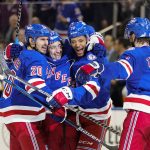 
              New York Rangers' Chris Kreider (20) celebrates with teammates K'Andre Miller (79) and Jacob Trouba (8) after scoring a goal during the second period of Game 2 of an NHL hockey Stanley Cup first-round playoff series against the Pittsburgh Penguins, Thursday, May 5, 2022, in New York. (AP Photo/Frank Franklin II)
            
