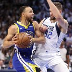 
              Golden State Warriors' Stephen Curry drives against Dallas Mavericks' Maxi Kleber during the first half of Game 4 of the NBA basketball playoffs Western Conference finals Tuesday, May 24, 2022, in Dallas. (Scott Strazzante/San Francisco Chronicle via AP)
            