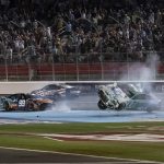 
              Chris Buescher (17) and Daniel Suarez (99) crash during a NASCAR Cup Series auto race at Charlotte Motor Speedway, Sunday, May 29, 2022, in Concord, N.C. (AP Photo/Matt Kelley)
            