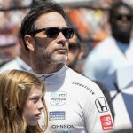
              Driver Jimmie Johnson watches a videoboard before the Indianapolis 500 auto race at Indianapolis Motor Speedway in Indianapolis, Sunday, May 29, 2022. (AP Photo/AJ Mast)
            