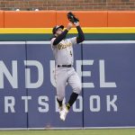 
              Pittsburgh Pirates center fielder Jake Marisnick catches the fly out hit by Detroit Tigers' Jeimer Candelario during the second inning in the second baseball game of a doubleheader, Wednesday, May 4, 2022, in Detroit. (AP Photo/Carlos Osorio)
            