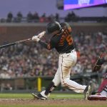 
              San Francisco Giants' Mike Yastrzemski (5) hits a single to drive in a run against the St. Louis Cardinals during the fifth inning of a baseball game Thursday, May 5, 2022, in San Francisco. (AP Photo/Tony Avelar)
            
