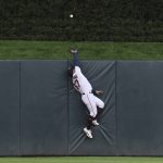 
              Minnesota Twins outfielder Gilberto Celestino (67) goes up to try and catch a two-run  home run hit of Detroit Tigers' Jeimer Candelario in the 10th inning of a baseball game Wednesday, May 25, 2022, in Minneapolis. Detroit won 4-2 in 10 innings. (AP Photo/Stacy Bengs)
            