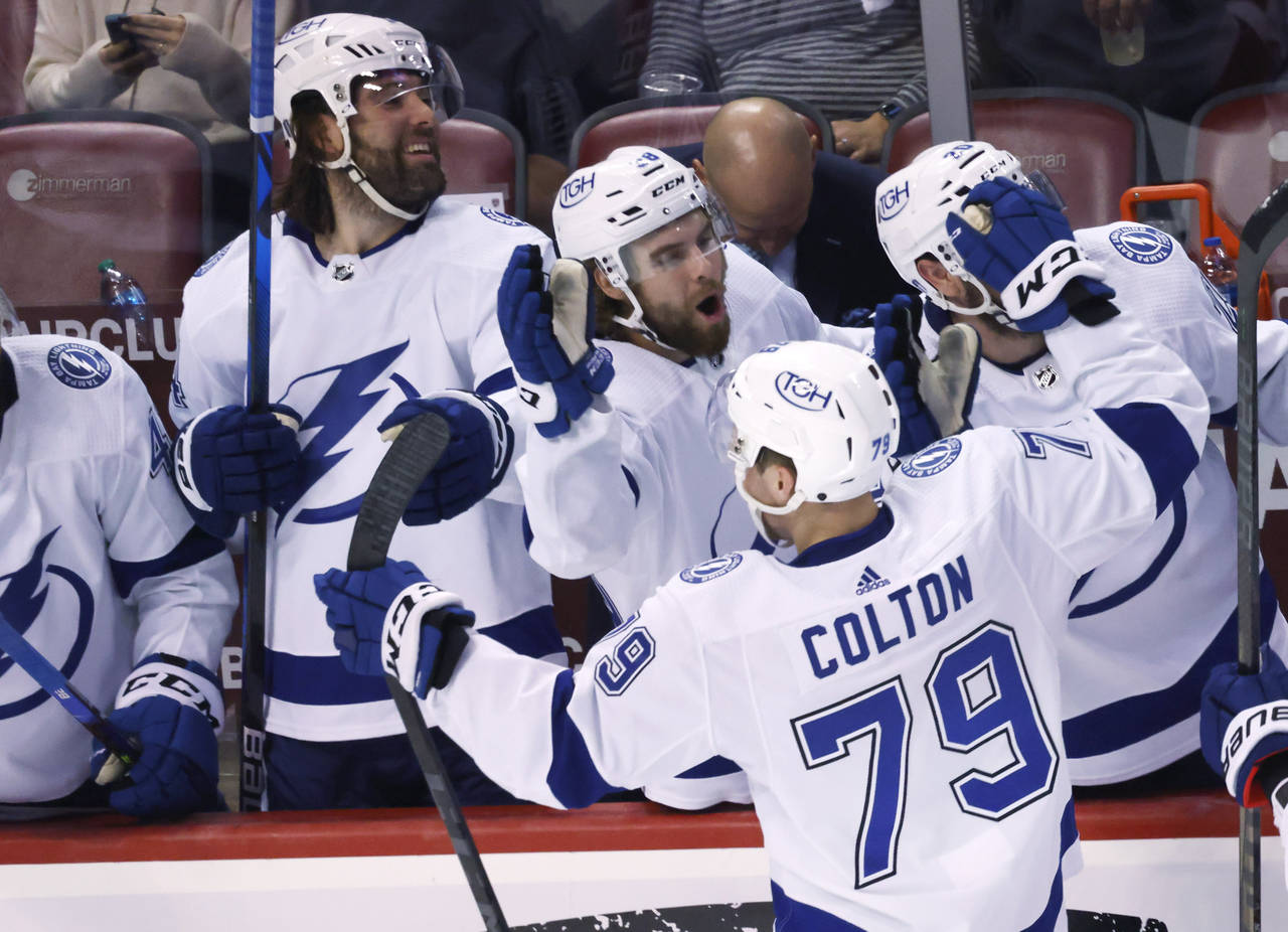 Tampa Bay Lightning center Ross Colton (79) is congratulated after scoring agains the Florida Panth...