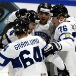 
              Team of Finland celebrate a goal during the 2022 IIHF Ice Hockey World Championships preliminary round group B match between Latvia and Finland in Tampere, Finland, Saturday, May 14, 2022. (Emmi Korhonen/Lehtikuva via AP)
            
