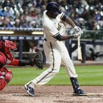 
              Milwaukee Brewers' Lorenzo Cain hits a single during the fifth inning of a baseball game Wednesday, May 4, 2022, in Milwaukee. (AP Photo/Morry Gash)
            