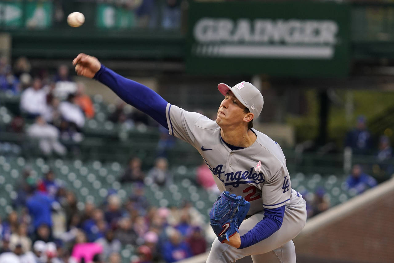 Los Angeles Dodgers starting pitcher Walker Buehler throws against the Chicago Cubs during the firs...
