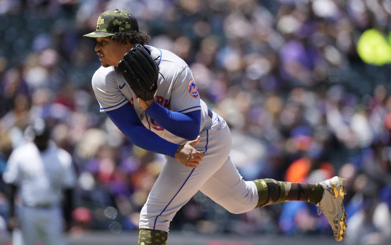 New York Mets' Taijuan Walker works against the Colorado Rockies in the first inning of a baseball ...