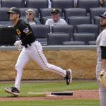 
              Pittsburgh Pirates' Josh VanMeter, left, watches his three-run home run off Colorado Rockies relief pitcher Justin Lawrence (61) during the seventh inning of a baseball game in Pittsburgh, Wednesday, May 25, 2022. The Pirates won 10-5. (AP Photo/Gene J. Puskar)
            