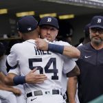 
              Detroit Tigers' Kody Clemens hugs teammate Derek Hill before the first inning of the second baseball game of a doubleheader against the Minnesota Twins, Tuesday, May 31, 2022, in Detroit. Clemens was making his debut with the Tigers in the major leagues. (AP Photo/Carlos Osorio)
            