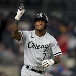 
              Chicago White Sox' Tim Anderson reacts towards the crowd while running the bases after hitting a three-run home run off New York Yankees relief pitcher Miguel Castro in the eighth inning of the second baseball game of a doubleheader, Sunday, May 22, 2022, in New York. (AP Photo/John Minchillo)
            
