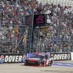 
              Josh Berry (8) takes the checkered flag to win the NASCAR Xfinity Series auto race at Dover Motor Speedway, Saturday, April 30, 2022, in Dover, Del. (AP Photo/Jason Minto)
            