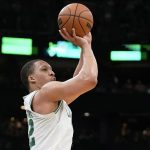 
              Boston Celtics forward Grant Williams shoots at the basket during the second half of Game 7 of an NBA basketball Eastern Conference semifinals playoff series against the Milwaukee Bucks, Sunday, May 15, 2022, in Boston. (AP Photo/Steven Senne)
            
