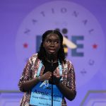 
              Annie-Lois Acheampong, 13, from Accra, Ghana, competes during the Scripps National Spelling Bee, Tuesday, May 31, 2022, in Oxon Hill, Md. (AP Photo/Alex Brandon)
            