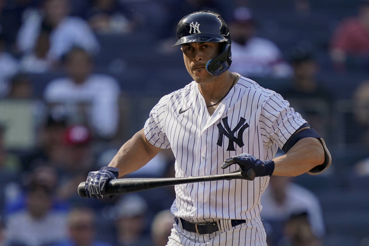 New York Yankees' Giancarlo Stanton reacts after striking out against Chicago White Sox starting pi...