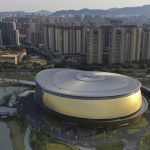 
              In this photo released by Xinhua News Agency, an aerial photo taken on Nov 9, 2021, shows a view of Gongshu Canal Sports Park Gymnasium, a venue of the 19th Asian Games Hangzhou 2022 in Hangzhou, east China's Zhejiang Province. Less than three months after Beijing hosted the Winter Olympics and Paralympics, the Olympic Council of Asia said Friday that this year's Asian Games in China are being postponed because of concerns about the spreading omicron variant of COVID-19 in the country.(Huang Zongzhi/Xinhua via AP)
            