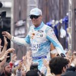 
              Kevin Harvick waves to fans during driver introductions before the NASCAR All-Star auto race at Texas Motor Speedway in Fort Worth, Texas, Sunday, May 22, 2022. (AP Photo/LM Otero)
            