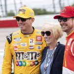 
              Kyle Busch, left, and Kurt Busch, right, pose with their mother, Gaye, prior to a NASCAR Cup Series auto race at Darlington Raceway, Sunday, May 8, 2022, in Darlington, S.C. (AP Photo/Matt Kelley)
            