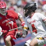 
              Maryland attack Eric Malever (4) plays against Cornell midfielder Harrison Bardwell (17) during the first half of the NCAA college men's lacrosse championship game, Monday, May 30, 2022, in East Hartford, Conn. (AP Photo/Bryan Woolston)
            