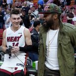 
              Miami Heat guard Tyler Herro, left, stands with former boxer Floyd Mayweather Jr. after the team's NBA basketball game against the Atlanta Hawks, Friday, April 8, 2022, in Miami. The Heat won 113-109. (AP Photo/Lynne Sladky)
            