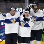 
              Finland's Toni Rajala, center, celebrates with teammates Sami Vatanen, left, and Joel Armia after scoring his side's third goal   during the group B Hockey World Championship match B match between Austria and Finland, in Tampere, Finland, saturday, May 21, 2022. (Jussi Nukari/Lehtikuva via AP)
            