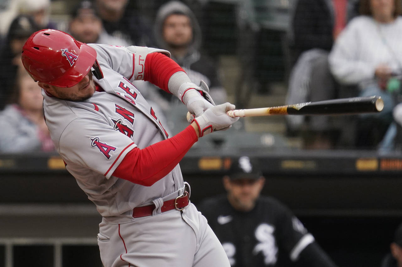 Los Angeles Angels' Mike Trout hits a solo home run during the first inning of a baseball game agai...