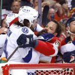 
              Tampa Bay Lightning left wing Pat Maroon, left, and Florida Panthers defenseman Radko Gudas scuffle during the second period of Game 2 of an NHL hockey second-round playoff series Thursday, May 19, 2022, in Sunrise, Fla. (AP Photo/Reinhold Matay)
            
