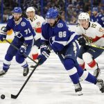
              Tampa Bay Lightning right wing Nikita Kucherov (86) gets past Florida Panthers center Anton Lundell (15) during the second period in Game 4 of an NHL hockey second-round playoff series Monday, May 23, 2022, in Tampa, Fla. (AP Photo/Chris O'Meara)
            