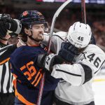 
              Los Angeles Kings' Blake Lizotte (46) and Edmonton Oilers' Kailer Yamamoto (56) rough it up during the third period of Game 1 of an NHL hockey Stanley Cup first-round playoff series, Monday, May 2, 2022 in Edmonton, Alberta. (Jason Franson/The Canadian Press via AP)
            