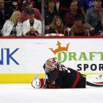 
              Carolina Hurricanes goaltender Antti Raanta (32) goes down on the ice with a lower body injury during the second period of Game 7 of an NHL hockey Stanley Cup second-round playoff series against the New York Rangers in Raleigh, N.C., Monday, May 30, 2022. (AP Photo/Karl B DeBlaker)
            