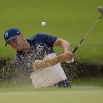 
              Jordan Spieth hits from the bunker on the 13th hole during a practice round for the PGA Championship golf tournament, Tuesday, May 17, 2022, in Tulsa, Okla. (AP Photo/Sue Ogrocki)
            